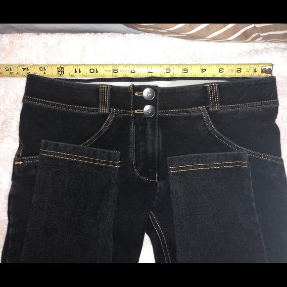 black jeans with yellow stitching